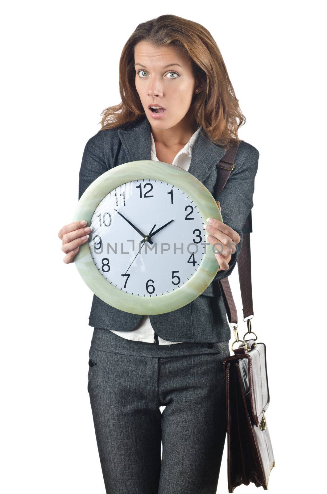 Businesswoman with clock isolated on white by Elnur