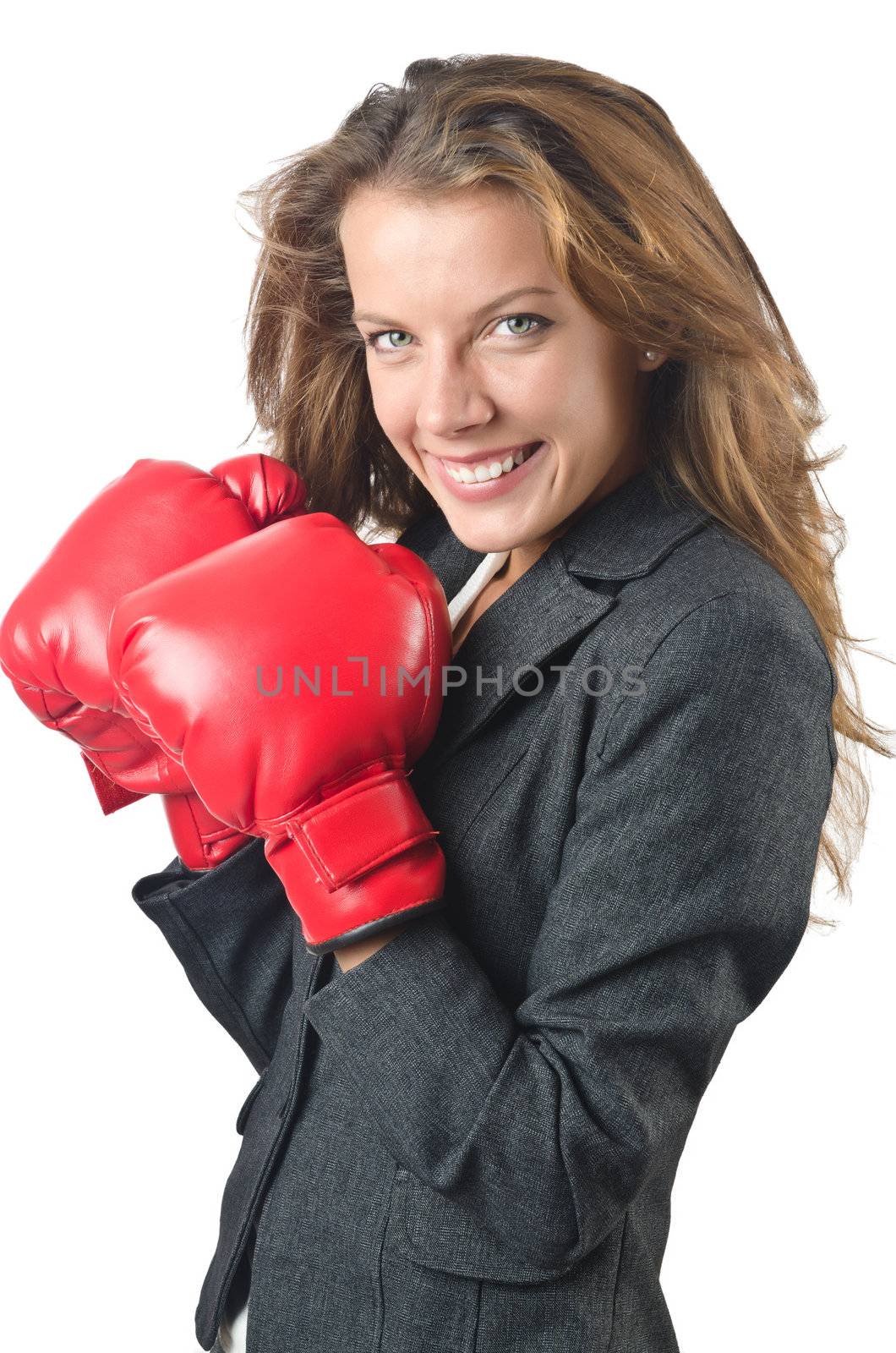 Young businesswoman in boxing concept