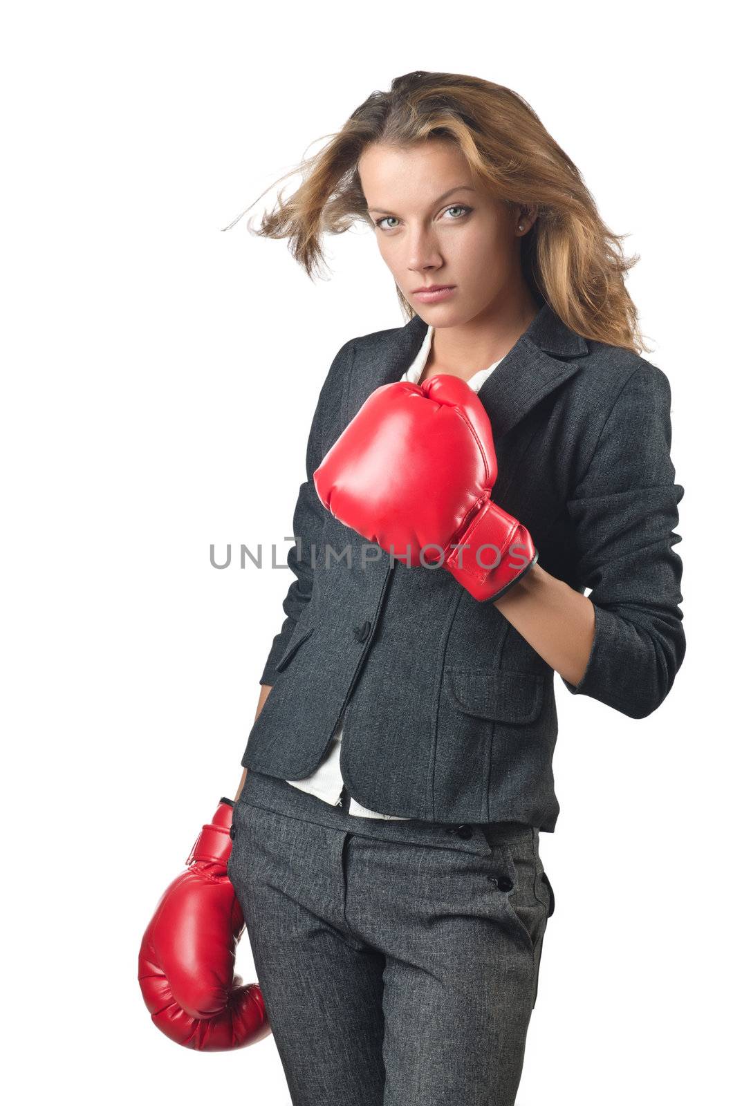 Young businesswoman in boxing concept