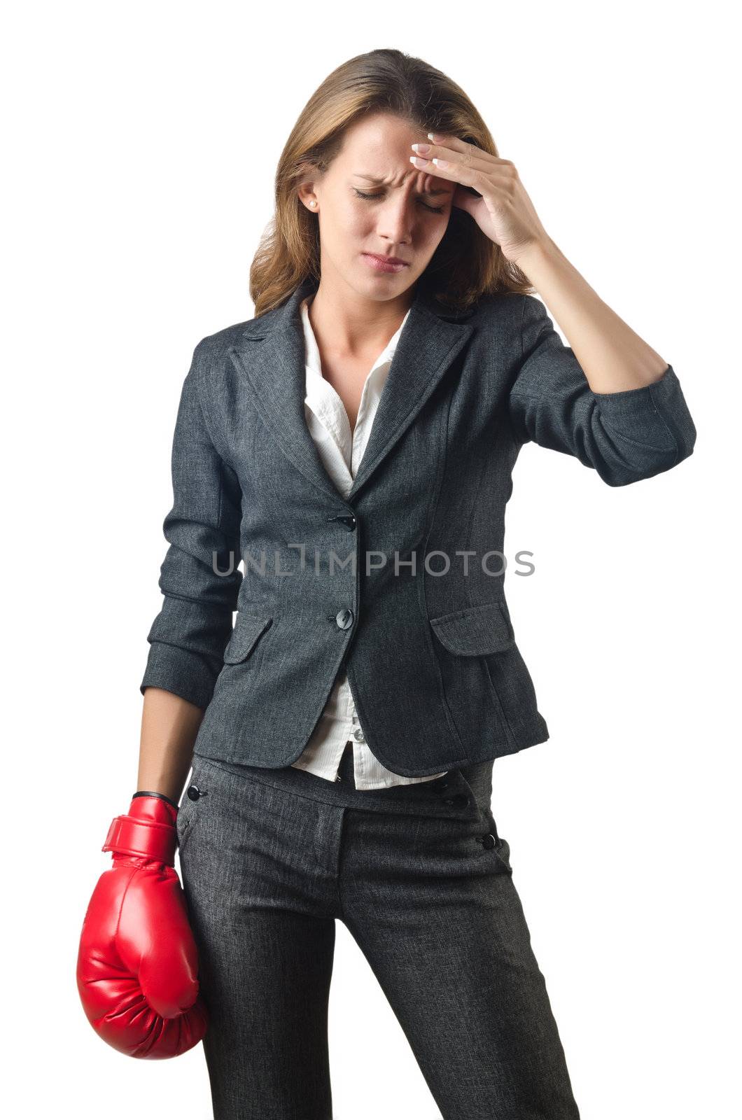 Young businesswoman in boxing concept