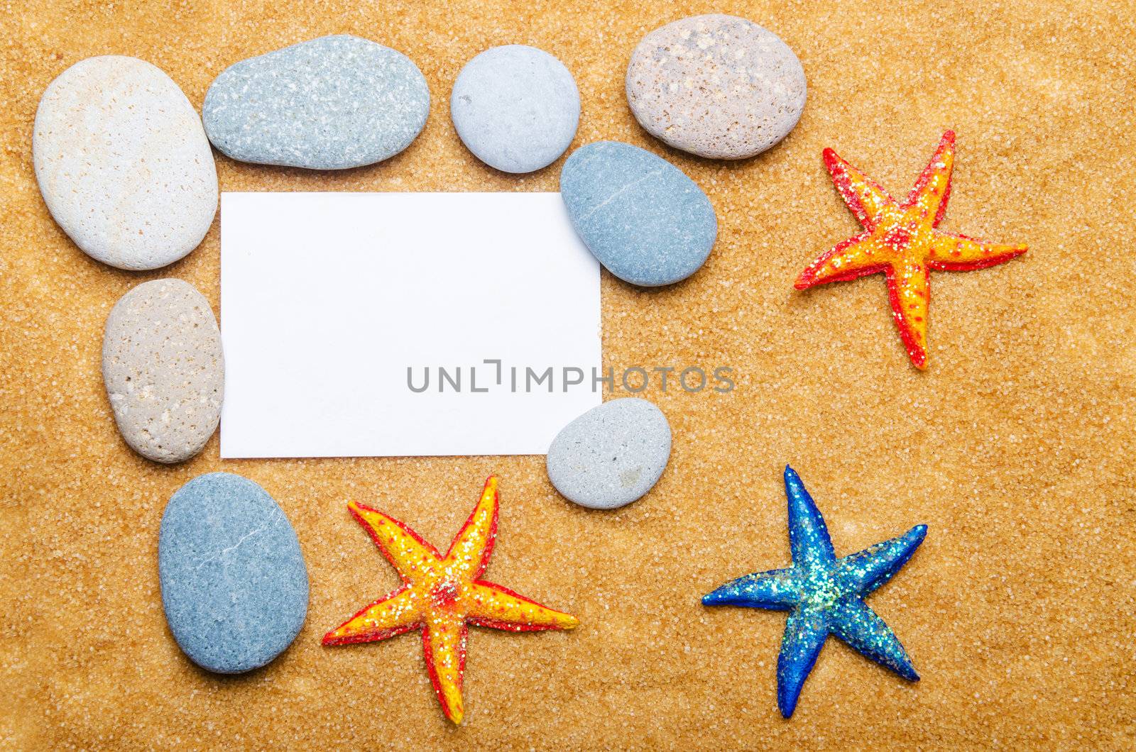 Blank message on sand and pebbles by Elnur