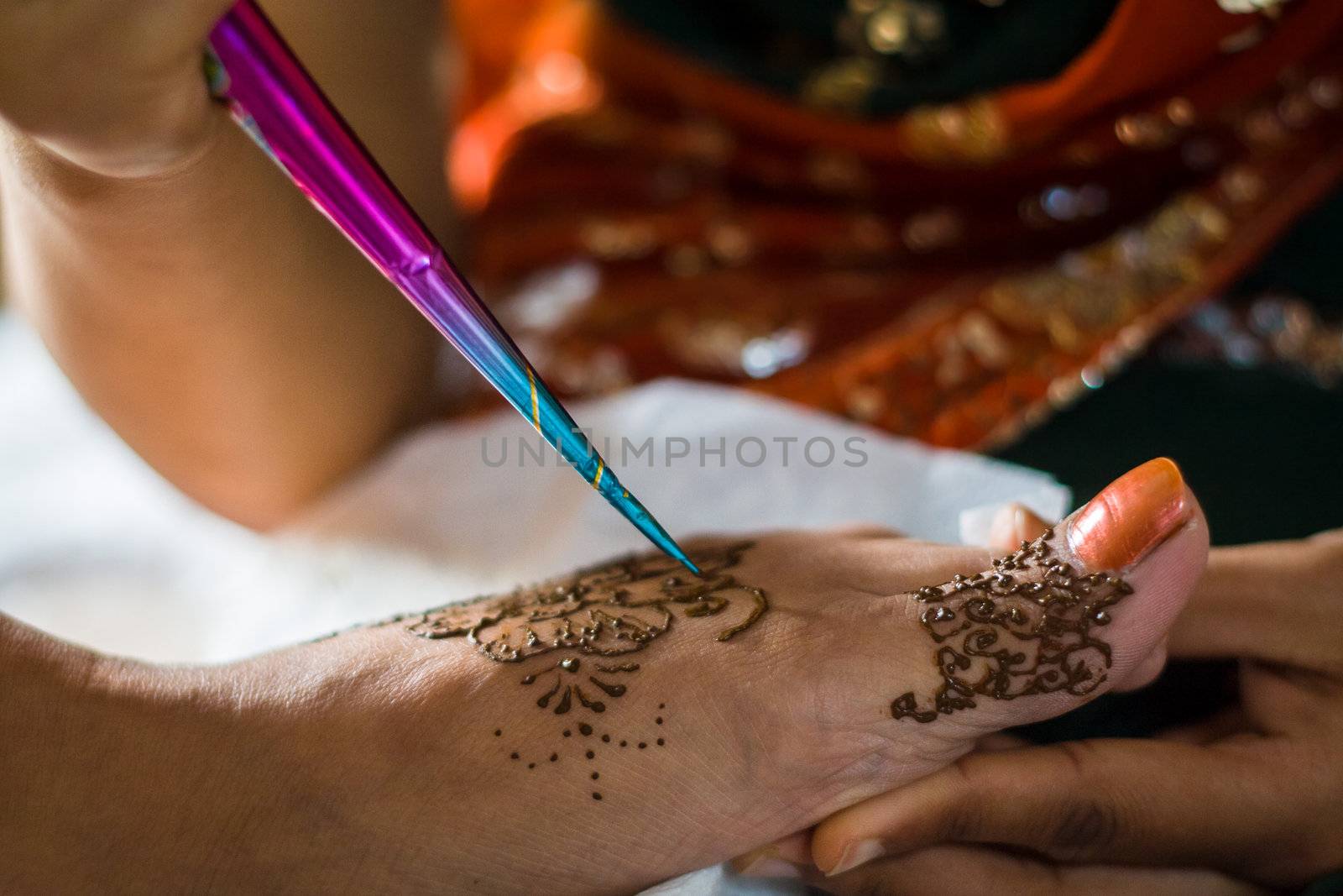 On the "Night of Mehndi" the bride's feet are decorated with elaborate designs with henna tattoo before the night of the wedding