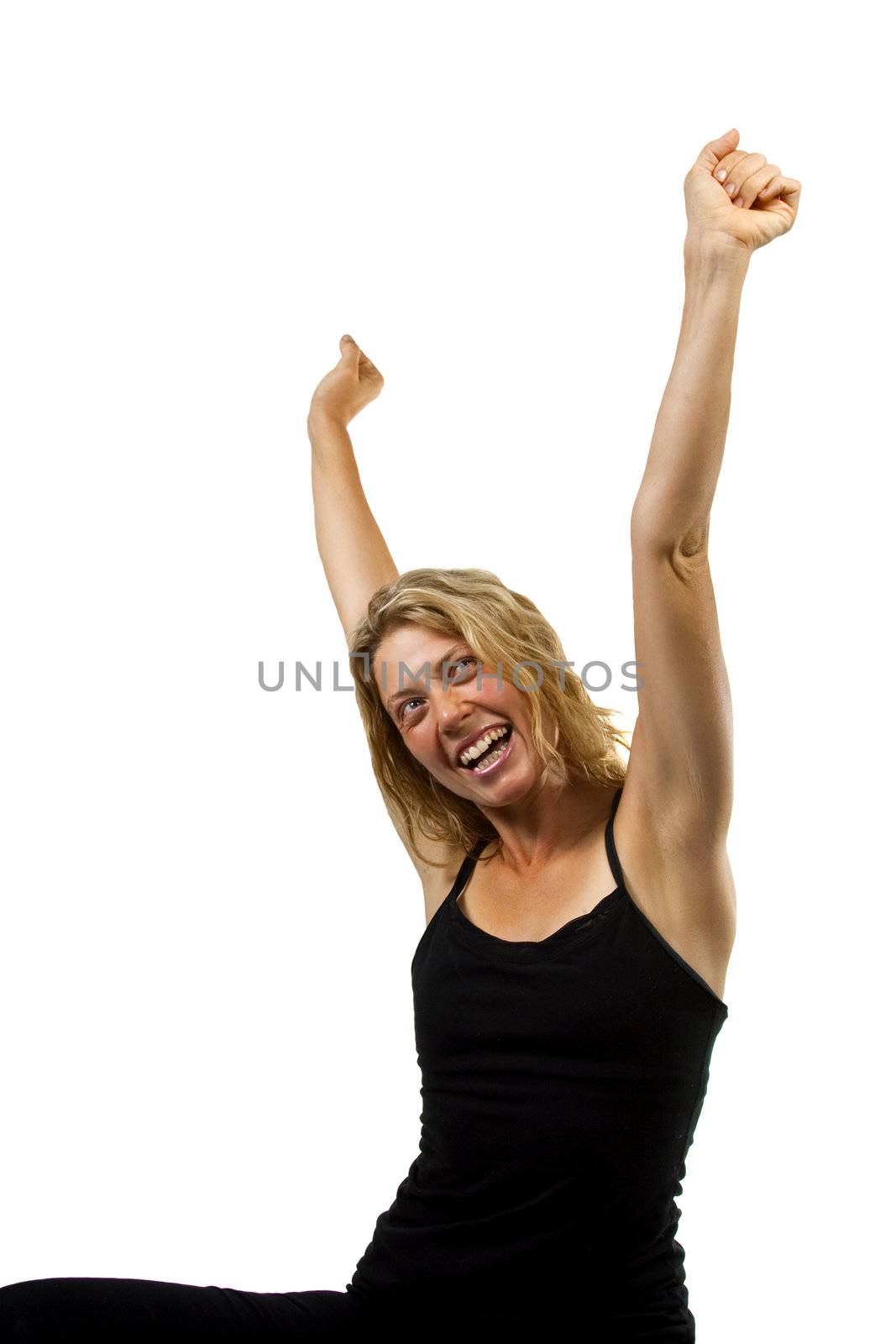 Happy woman cheers with hands in the air, side