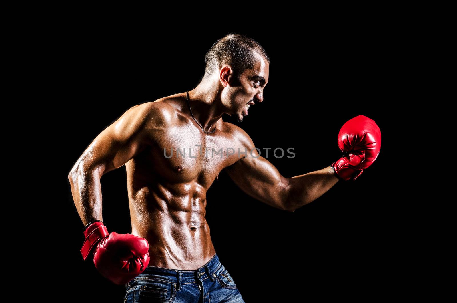 Young man with boxing gloves by Elnur