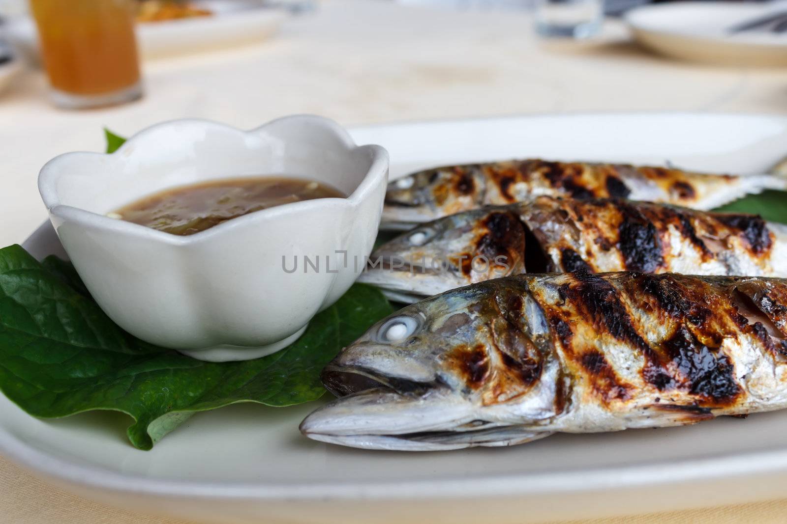 Grilled scomber fish with special fish sauce.