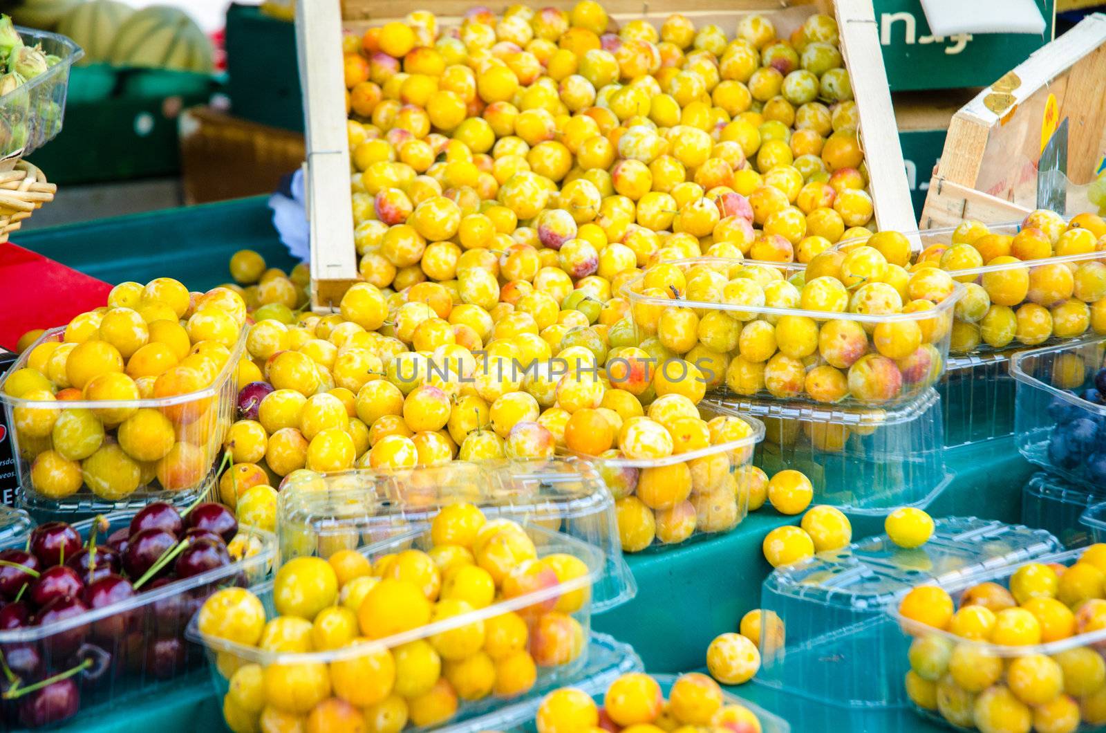 Fresh plums on the market by Elnur