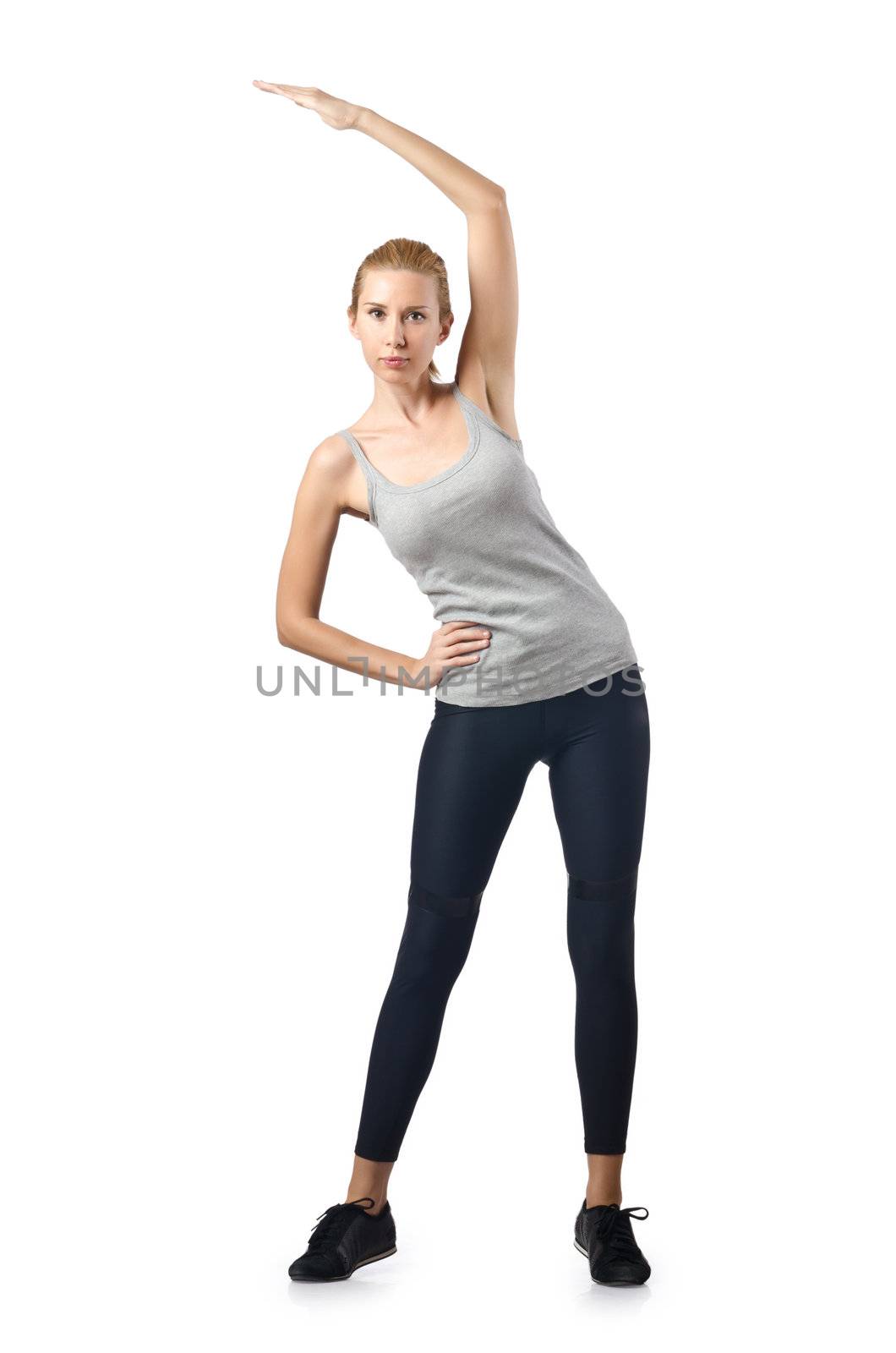 Woman doing exercises on white by Elnur