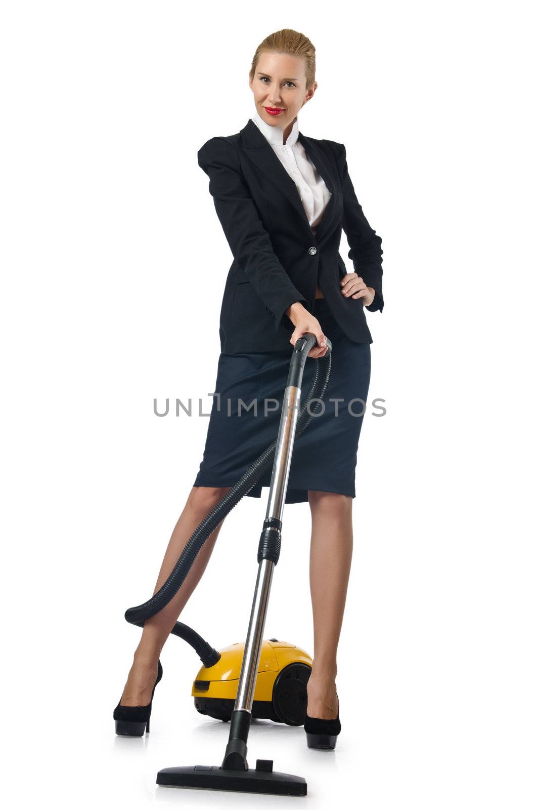 Businesswoman doing vacuum cleaning on white