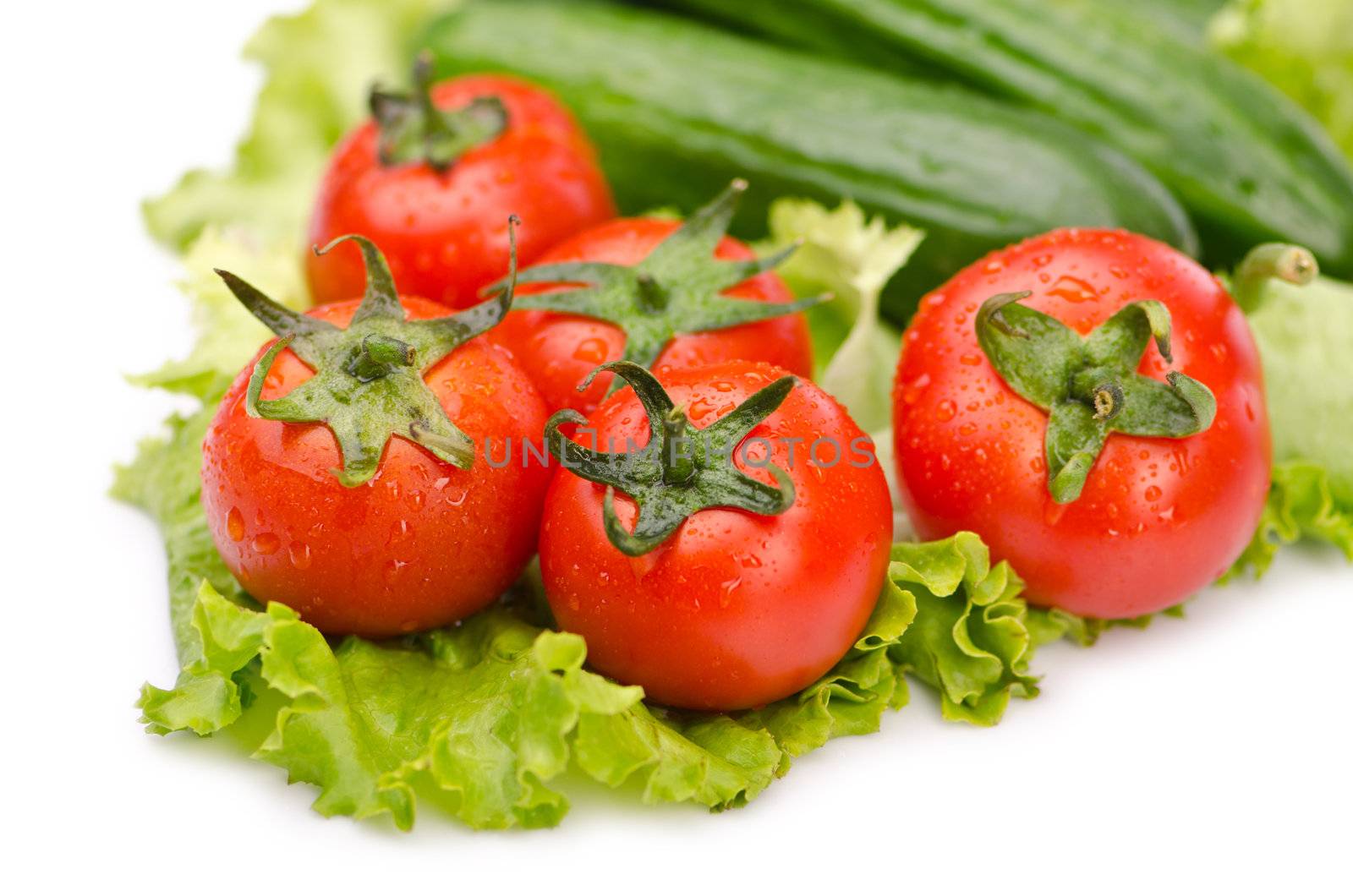 Cucumbers and tomatoes ready for salad by Elnur