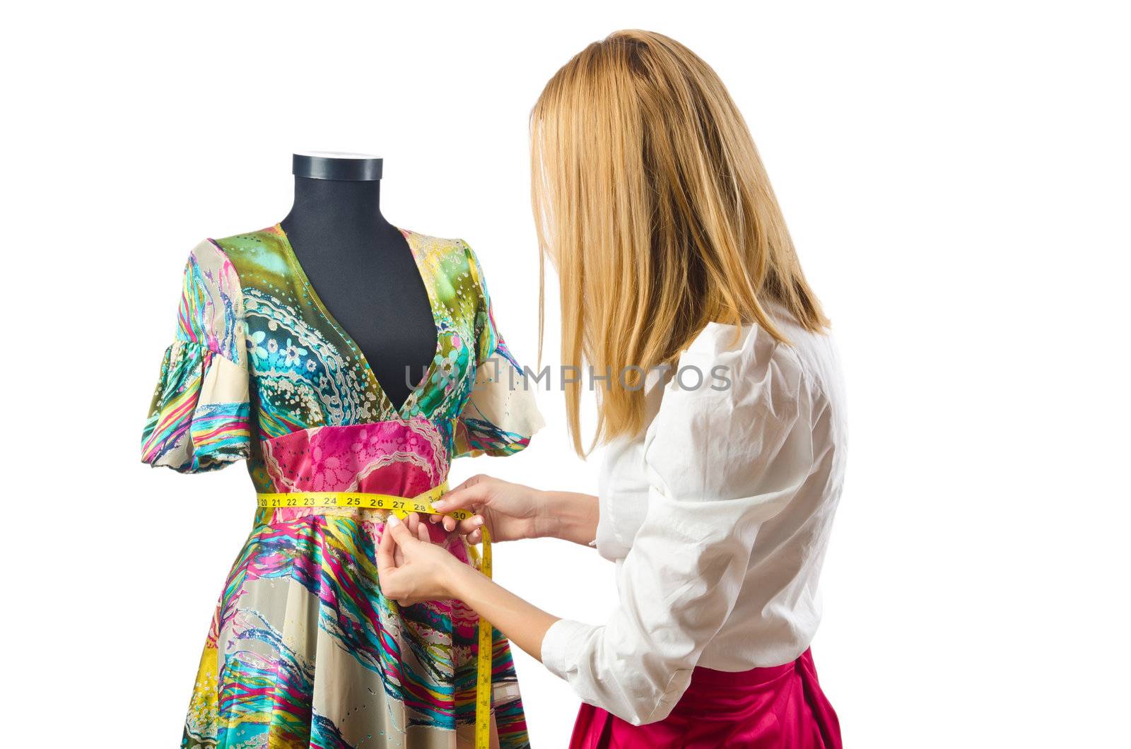 Woman tailor working on dress 