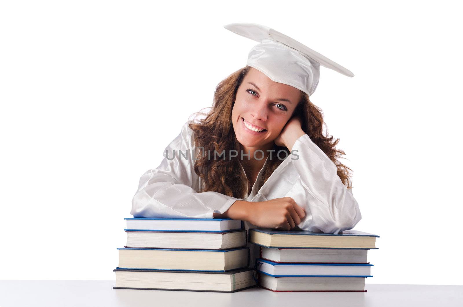 Happy graduate with lots of books on white