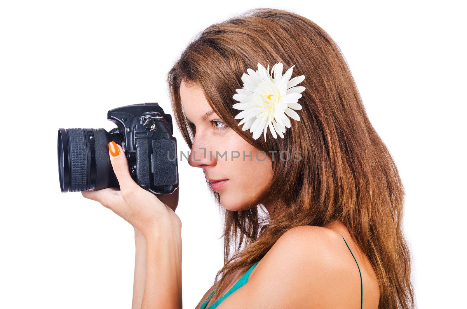 Attractive female photographer on white