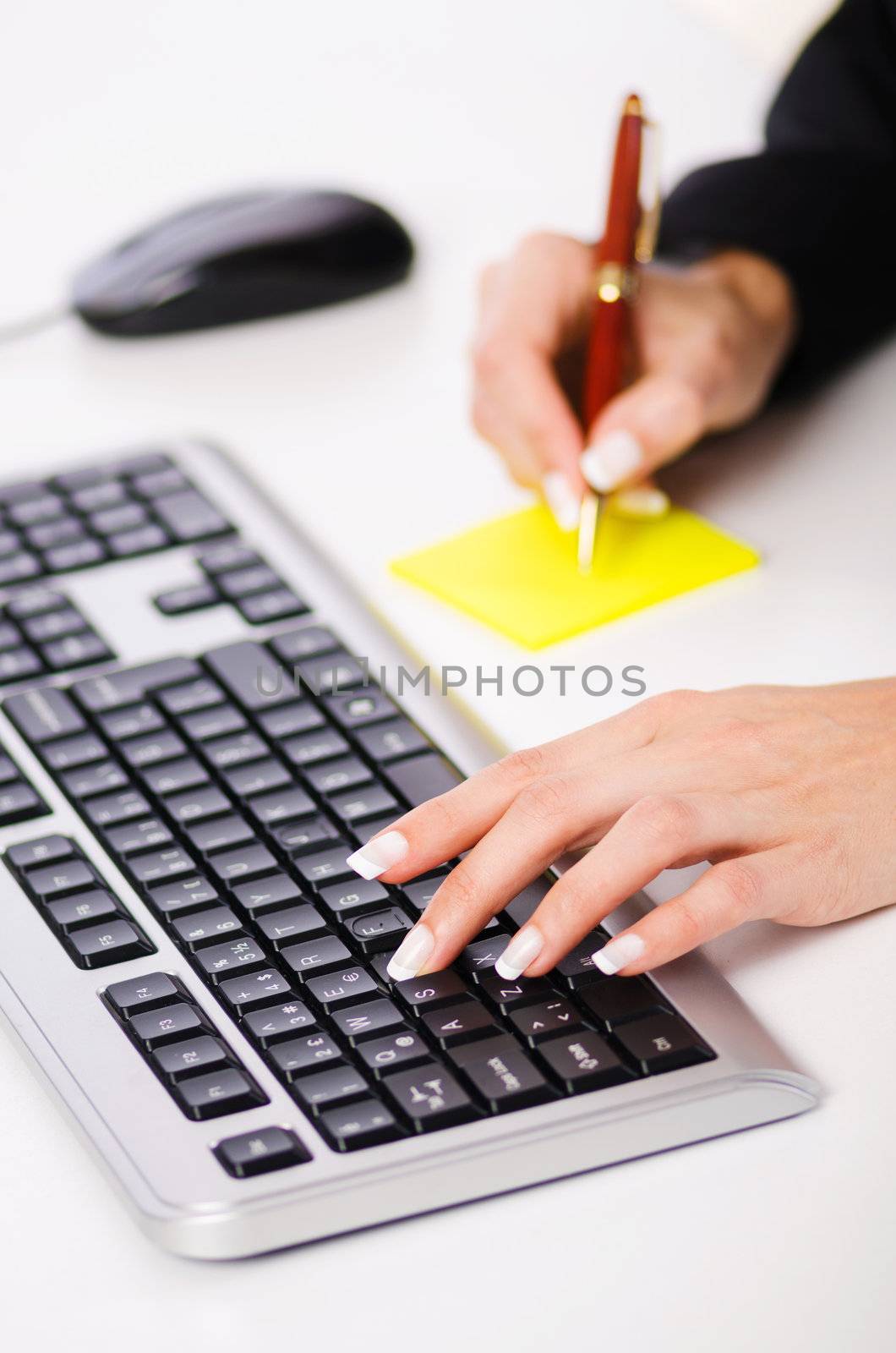 Hands working on the keyboard