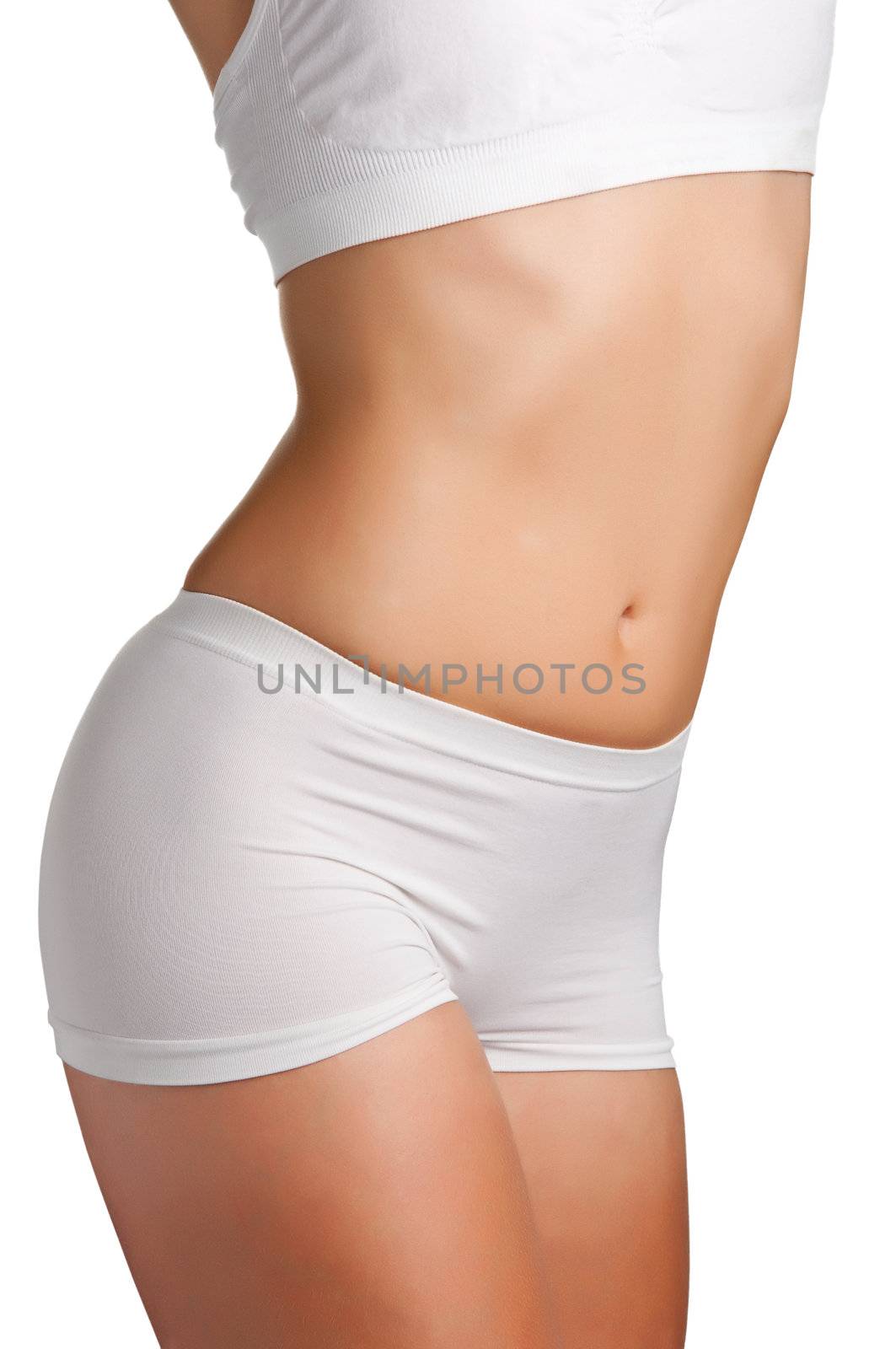 Closeup of a slim female body on a white background
