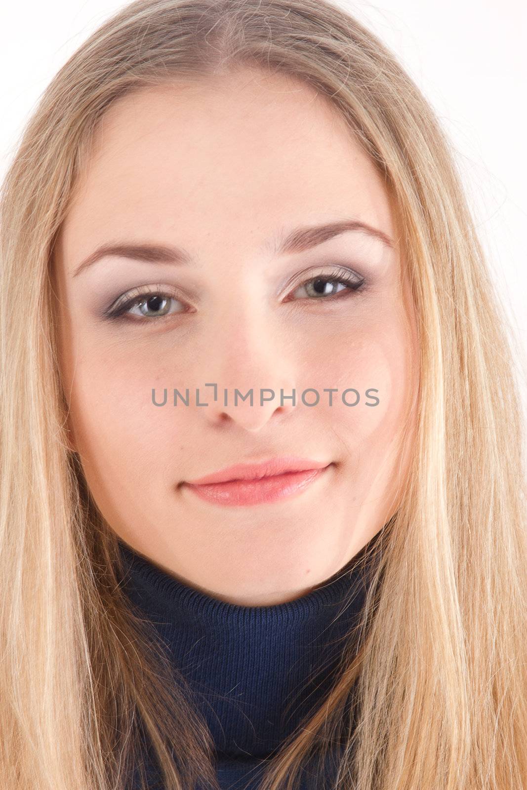 Portrait of blond long hair girl in blue  dress