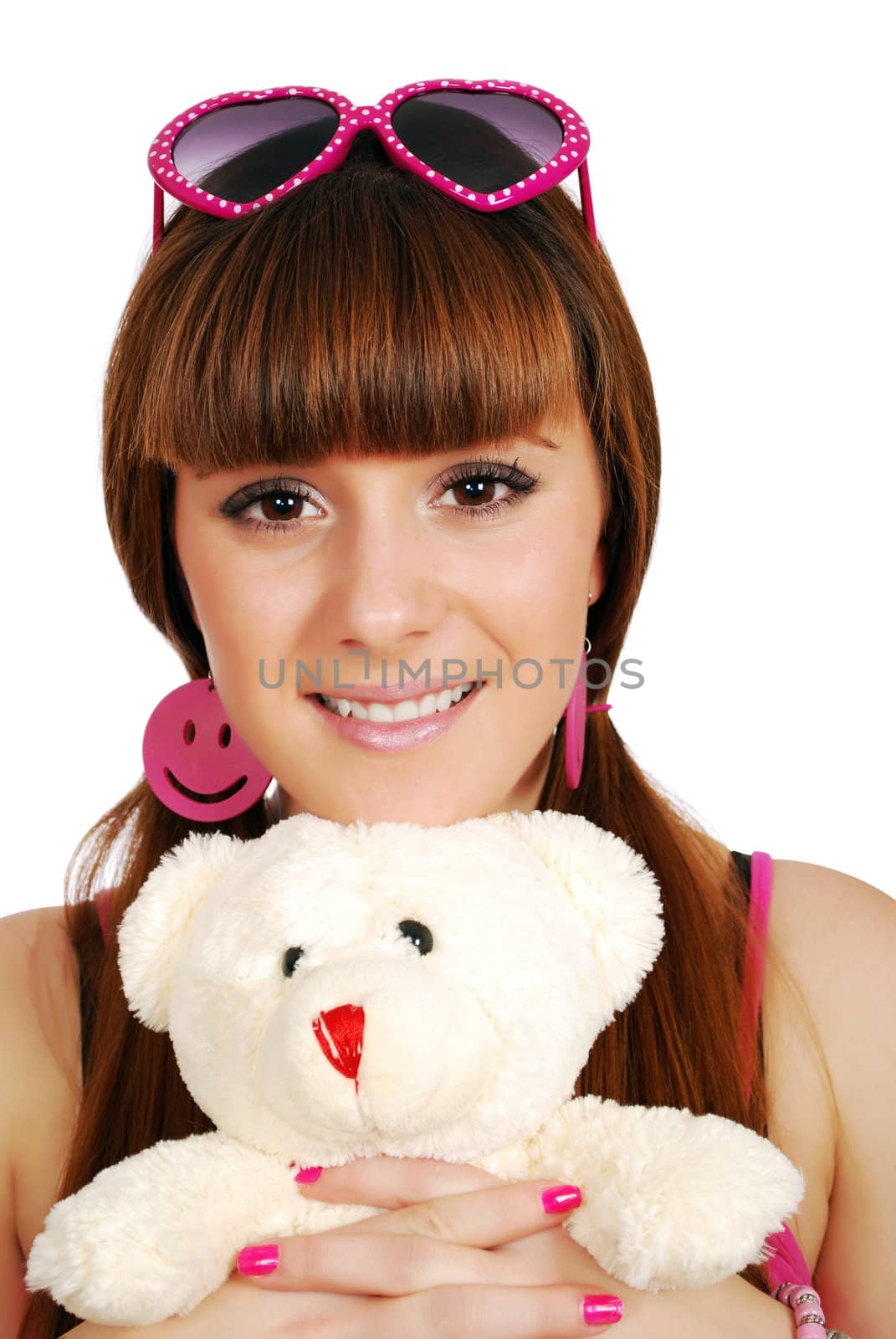 Teenage girl with teddy-bear studio shot