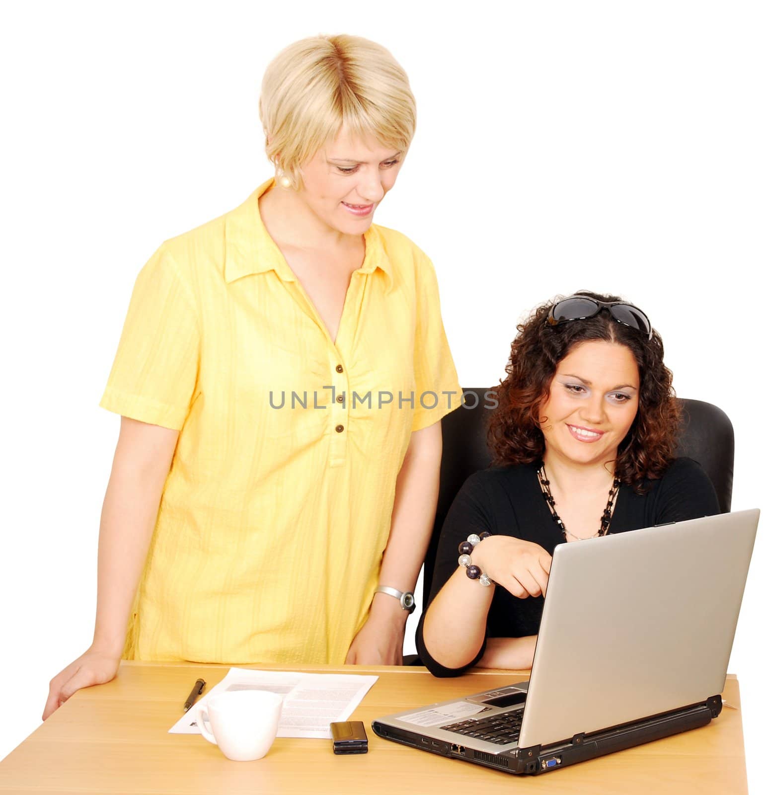 women watch something fun on laptop