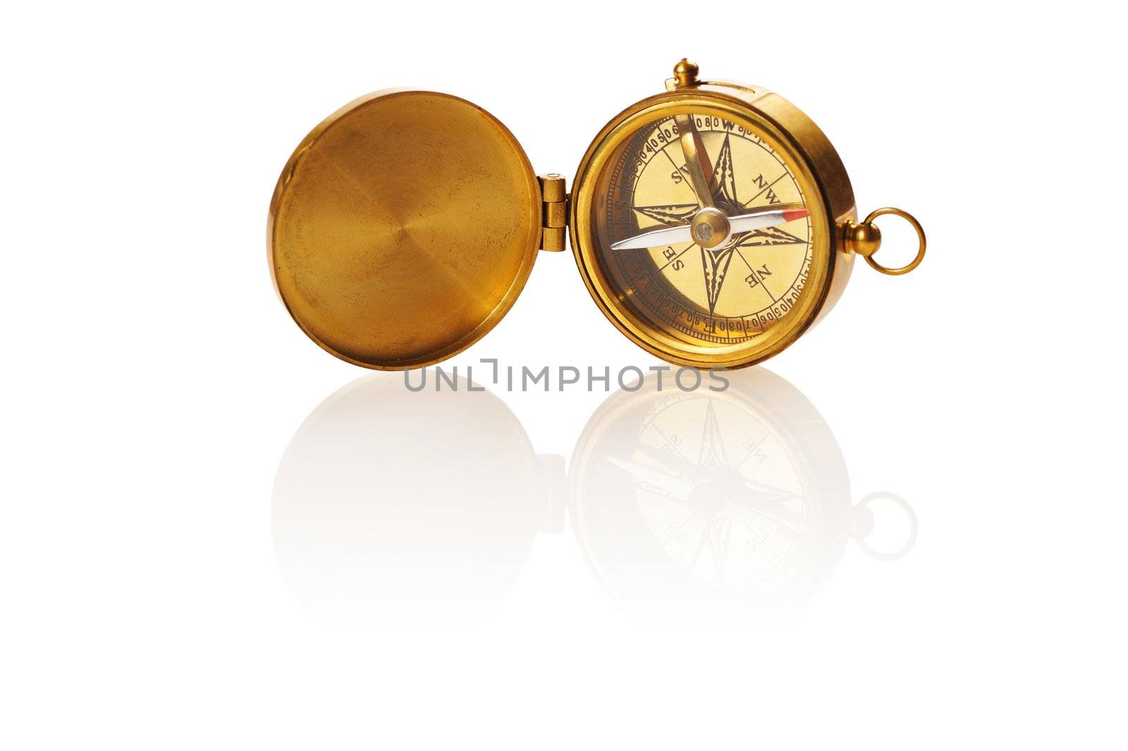 Old compass isolated on white background with soft reflection