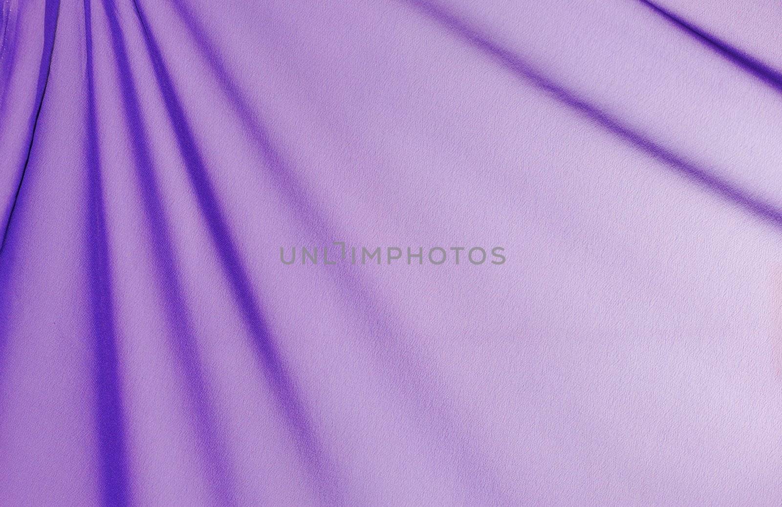 Beautiful folded violet silk background