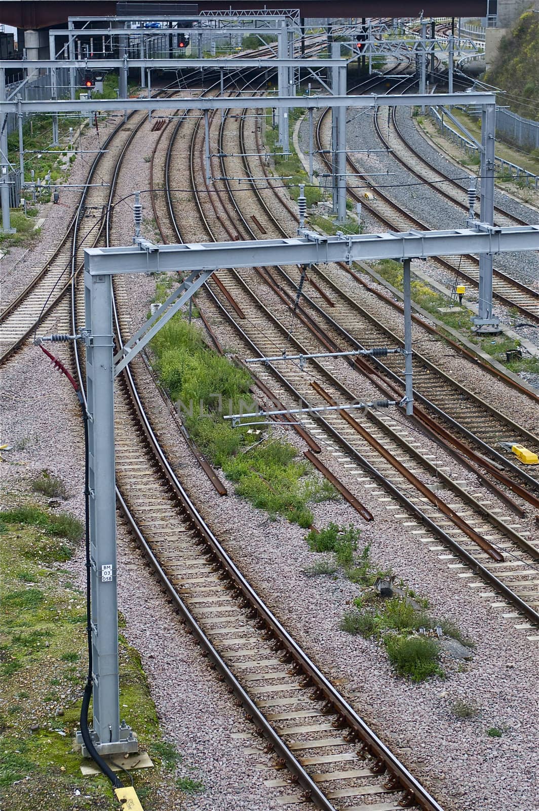 Numerous empty outdoor railway/ train tracks with copy space.