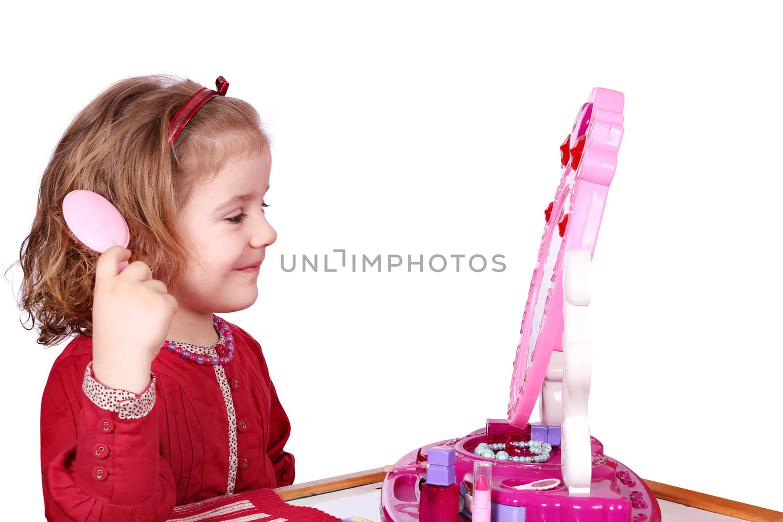 little girl with comb
