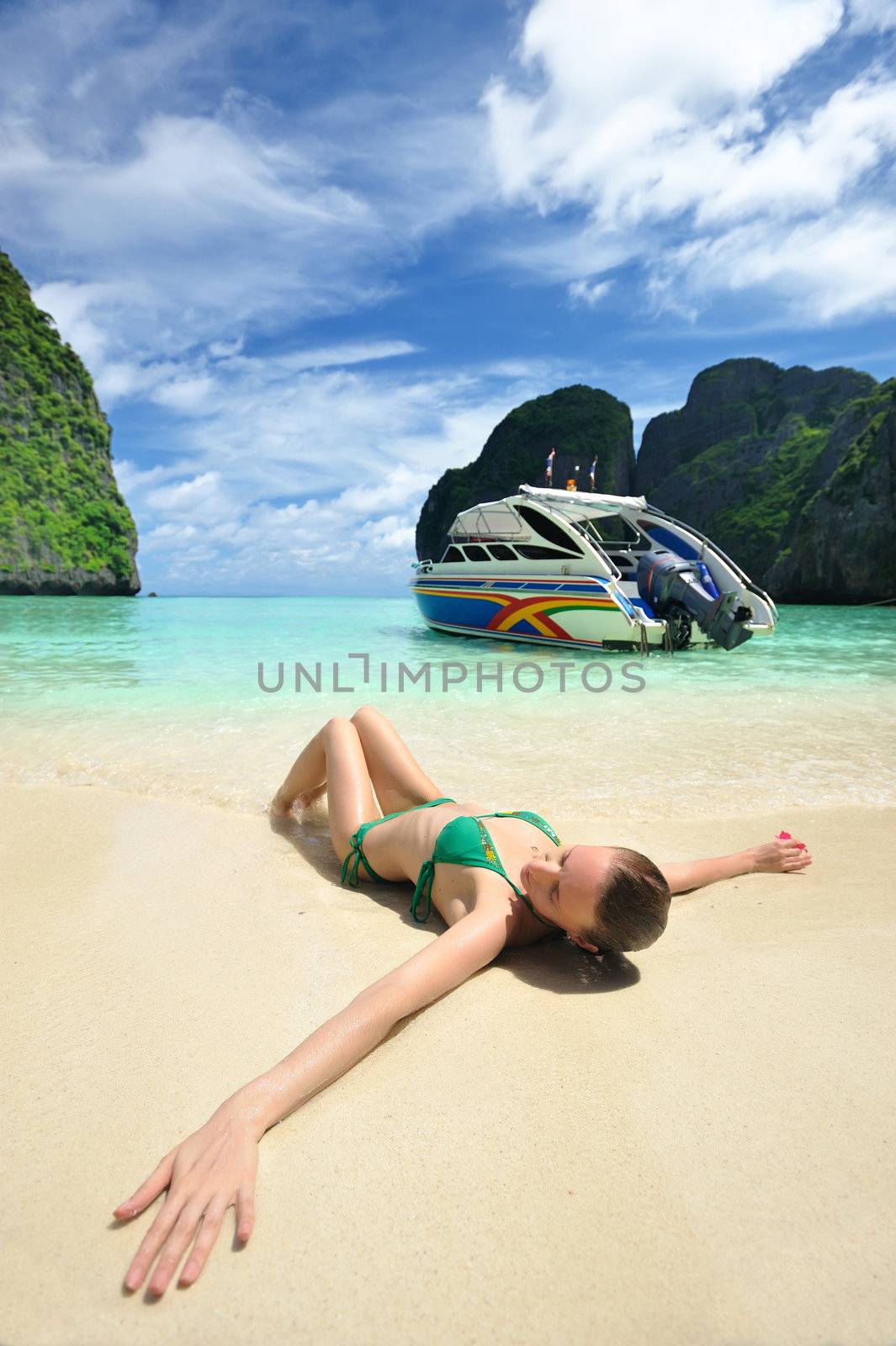 Woman in beautiful lagoon at  Phi Phi Ley island, the exact place where "The Beach" movie was filmed