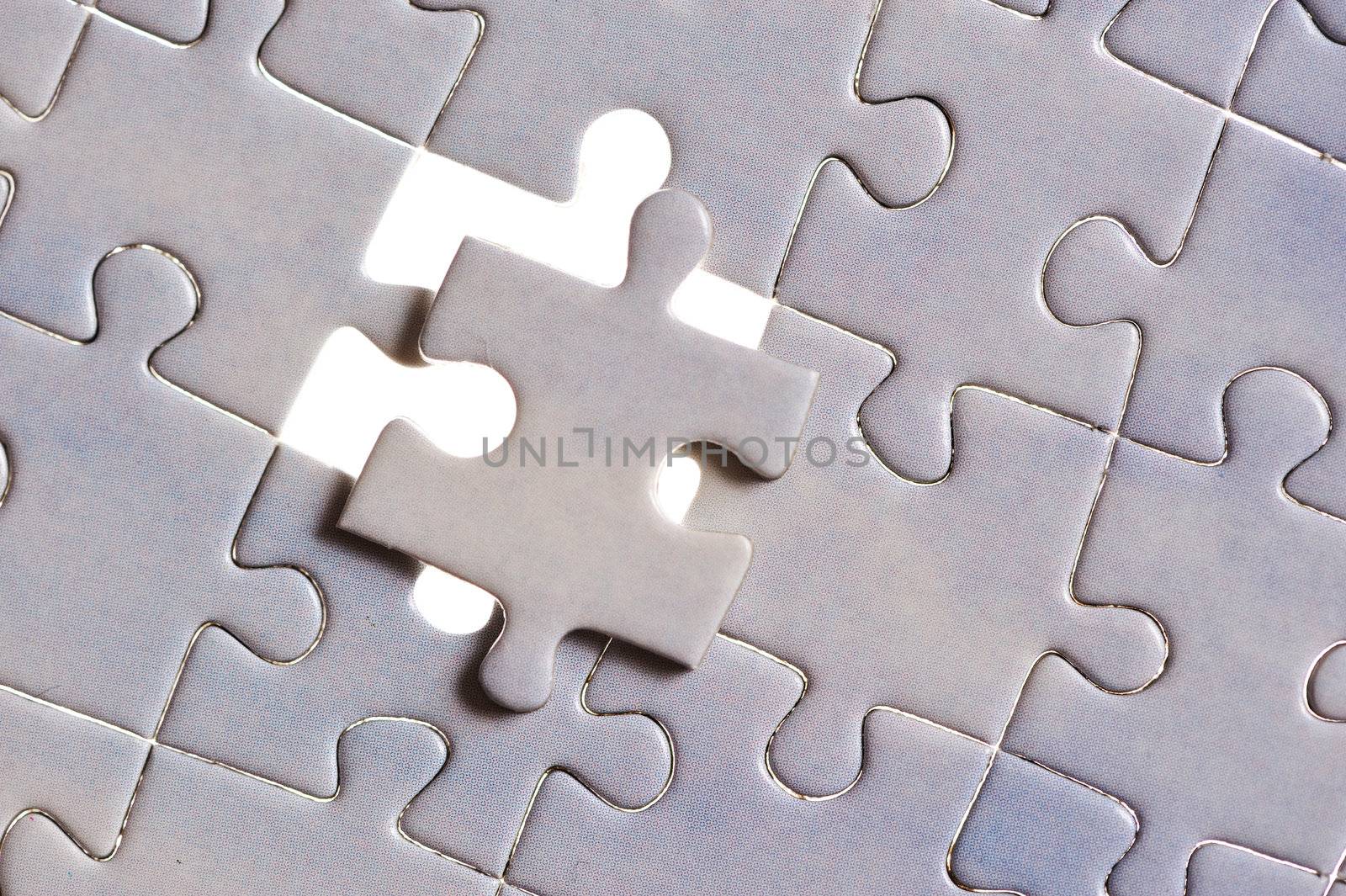 Jigsaw puzzle with one piece missing background