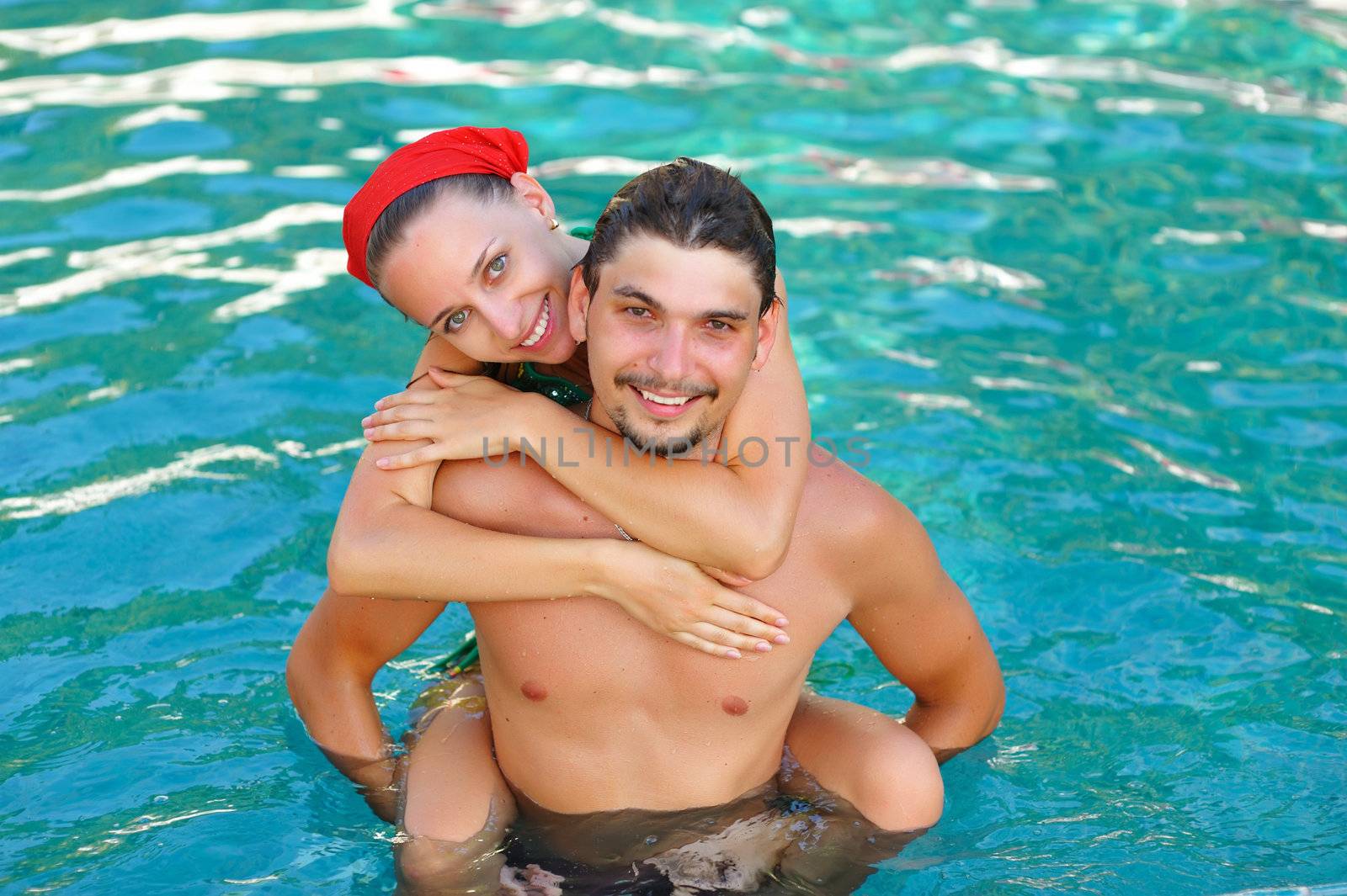 Couple in pool by haveseen