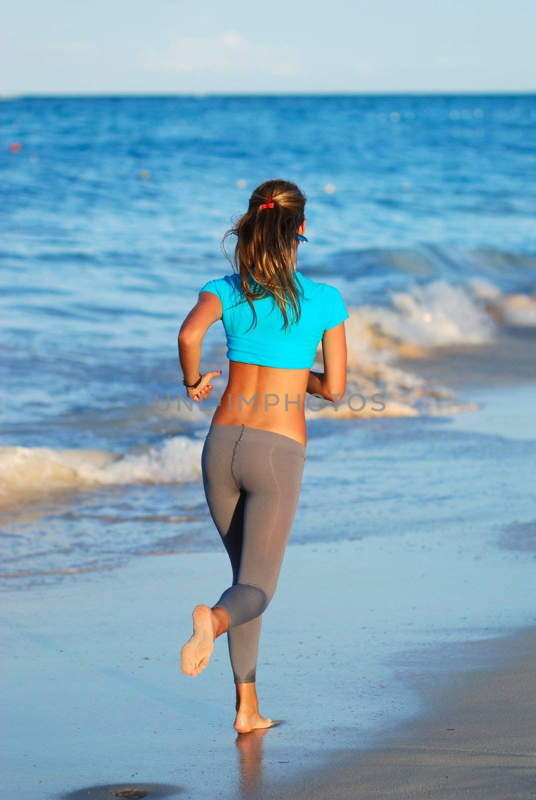 Jogging at beach by haveseen