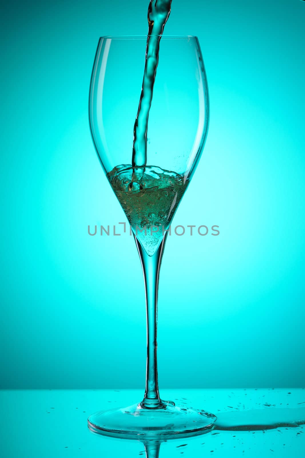 Pouring champagne into a glass