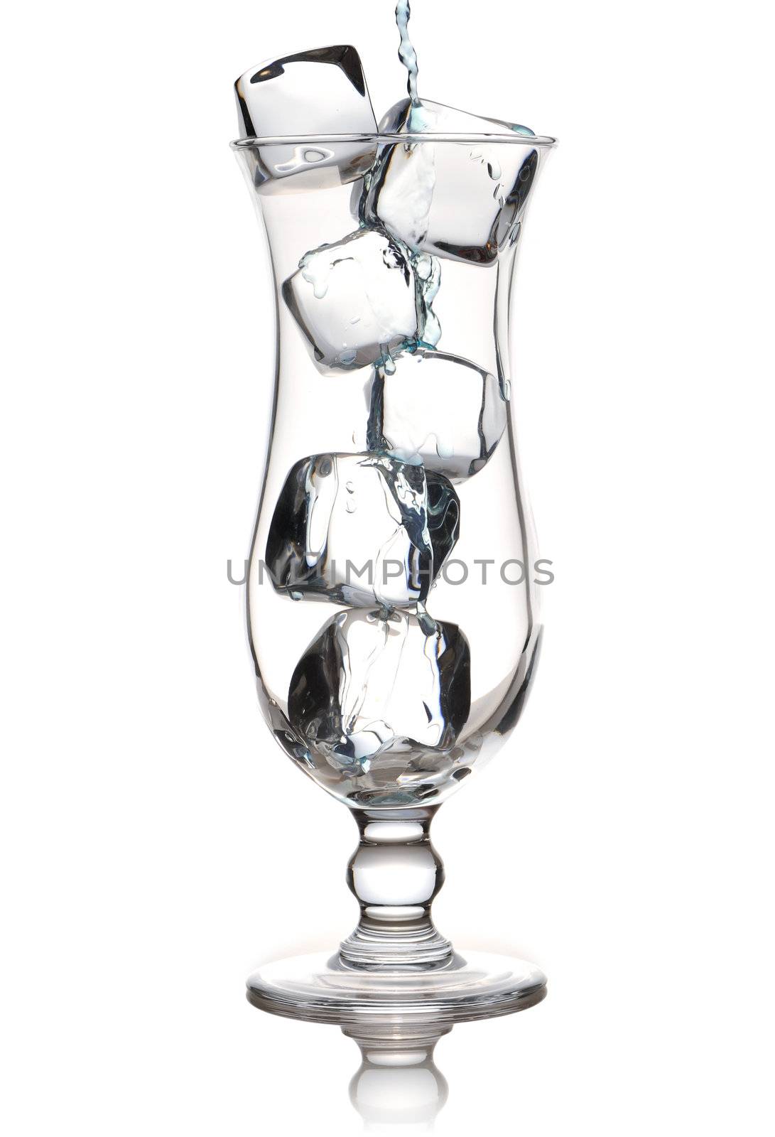 Glass with ice isolated on white background