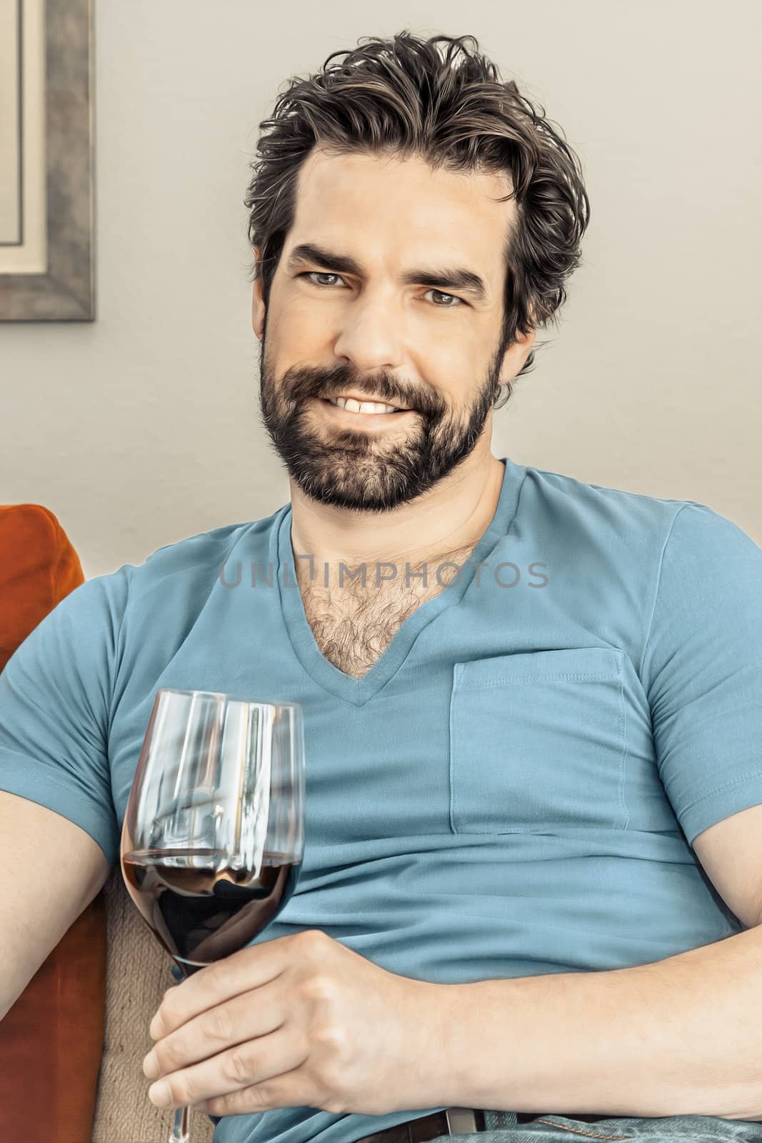 An image of a handsome man with a glass of wine