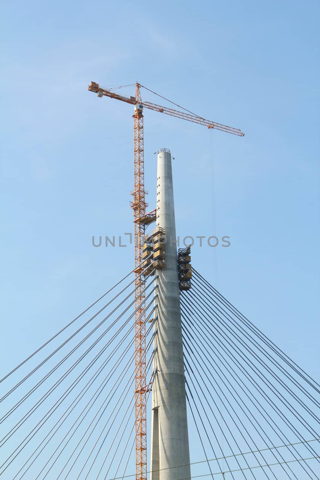 giant concrete pylon and crane