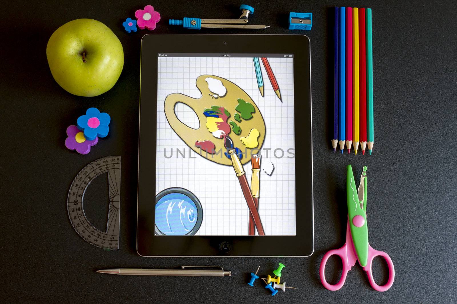 Ipad 3 with school accesories on white background