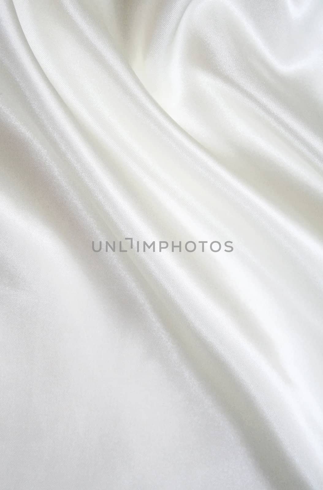 Smooth elegant white silk as background by oxanatravel