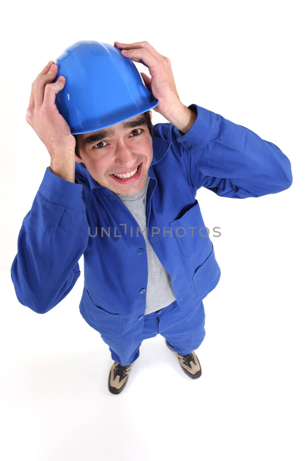 craftsman holding his helmet