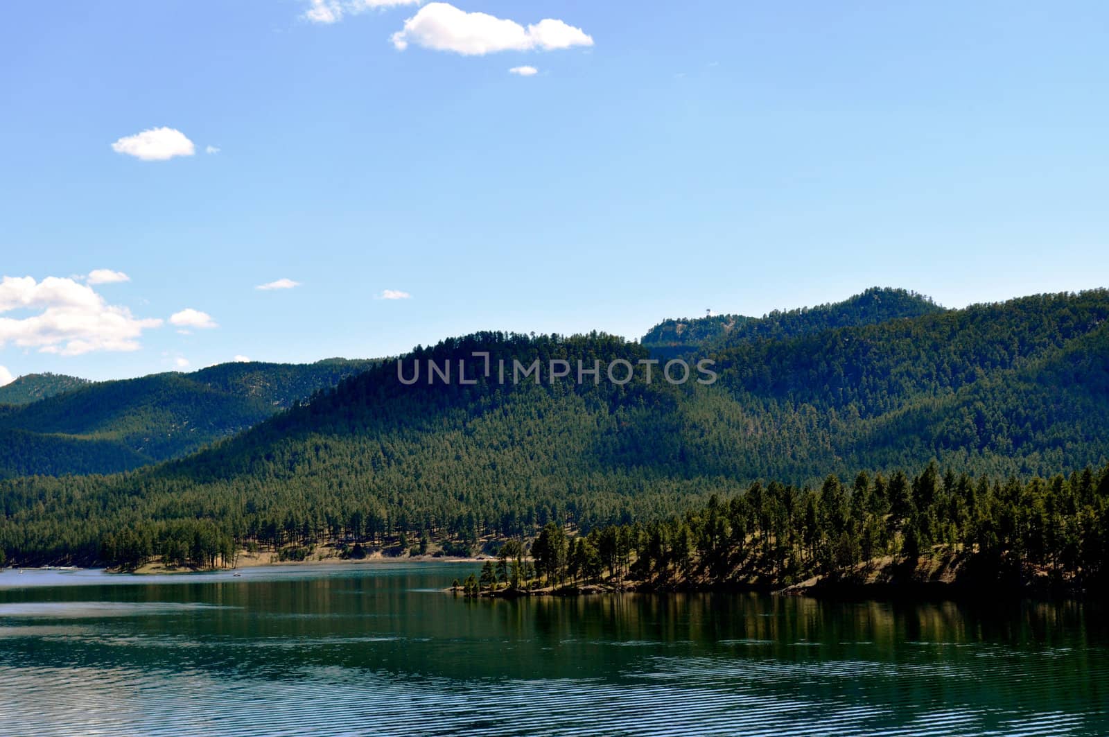 Black hills and water background