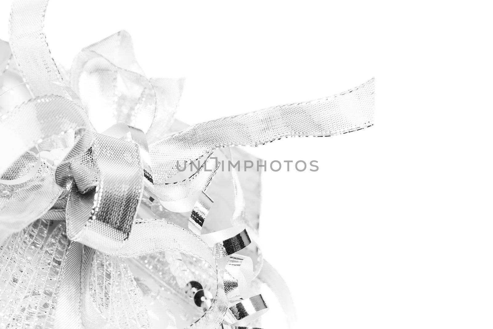 closeup of a silver christmas present on white background