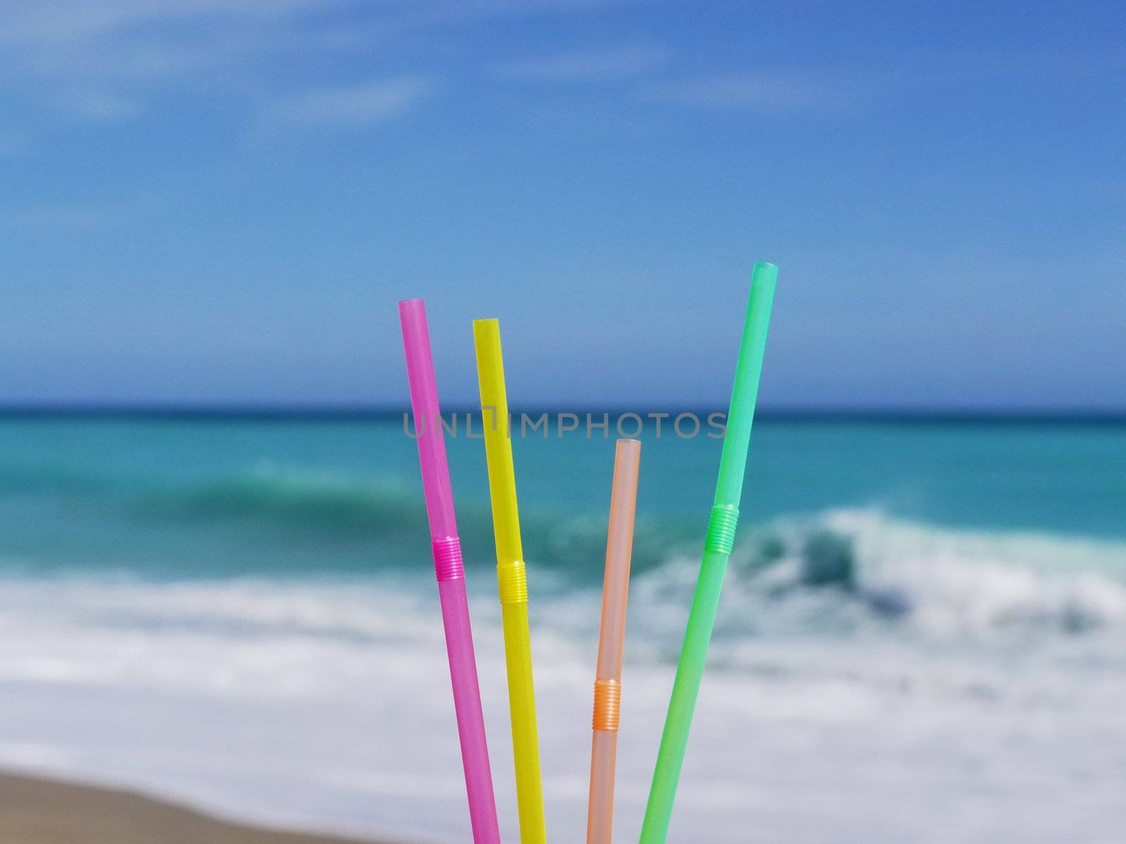 straw beach drink by yucas