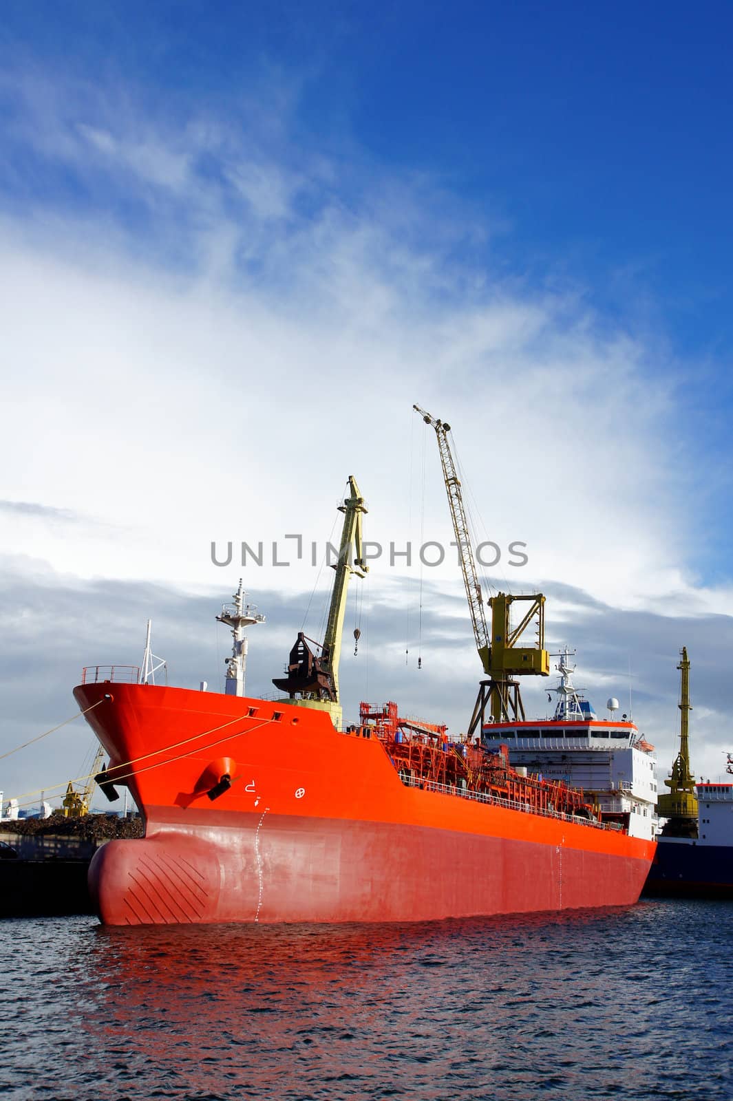 The tanker is moored in the port