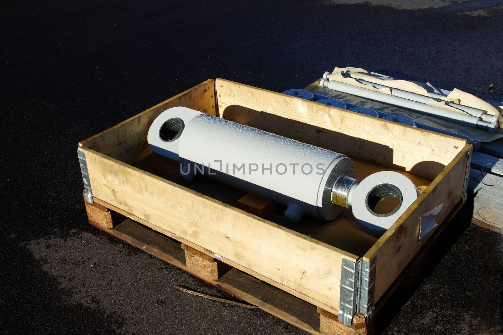 The grey hydrocylinder is prepared for transportation