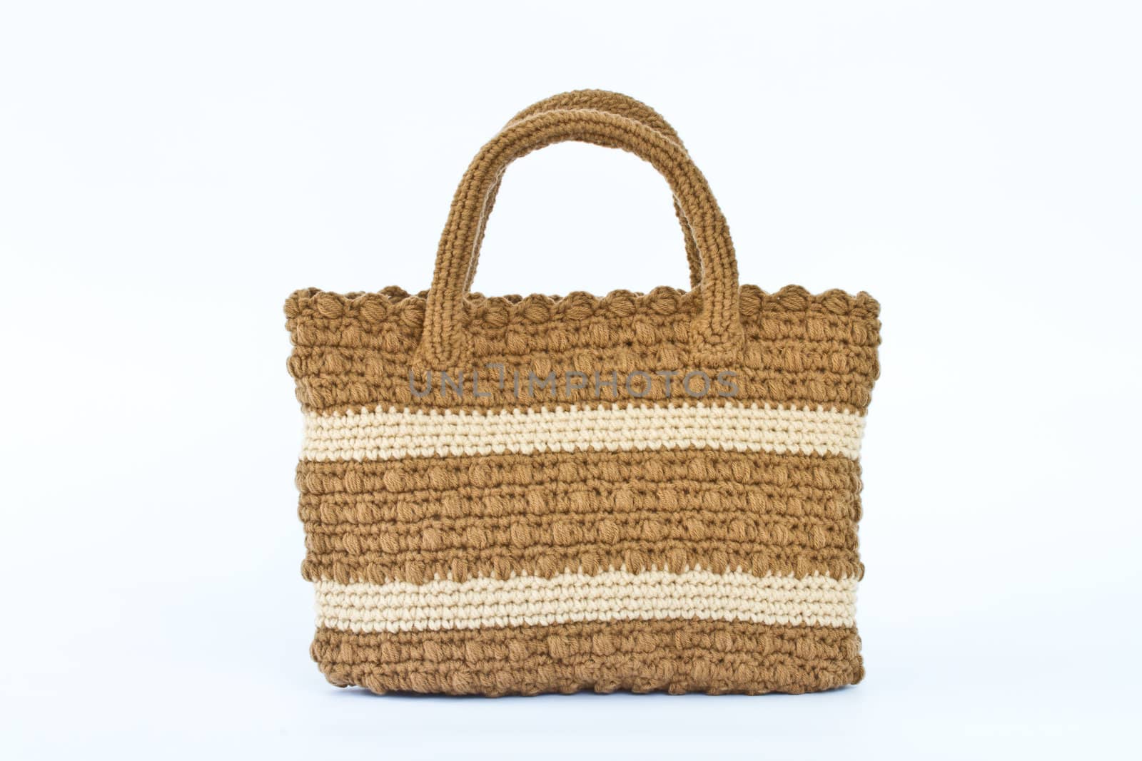 Crochet bag on white background