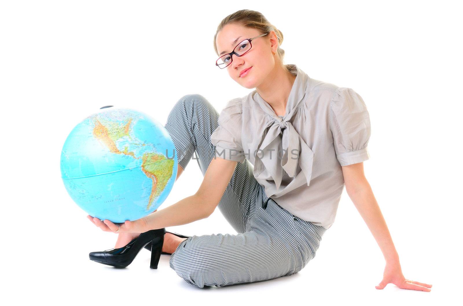 Globe in beauty hands of sitting young woman