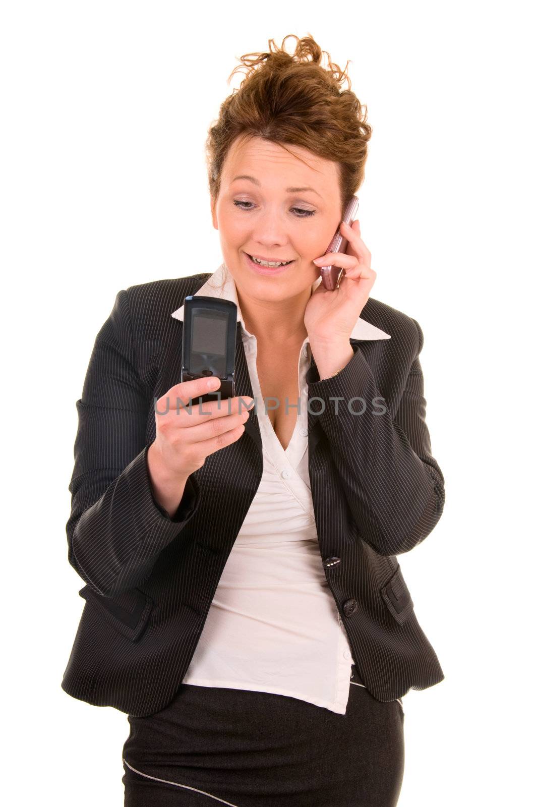 Businesswomen is talking by mobile phone and checking data in other phone. Isolated on white background