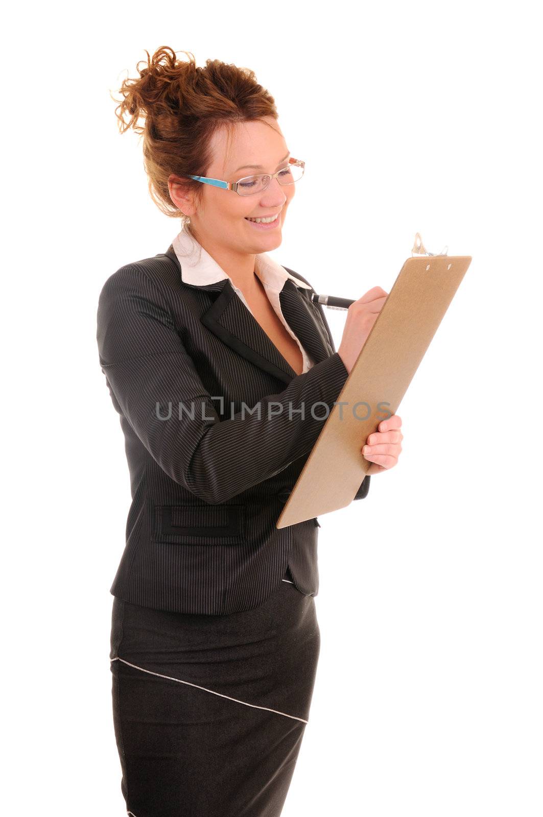 Smiling business woman is writing in document isolated on white background