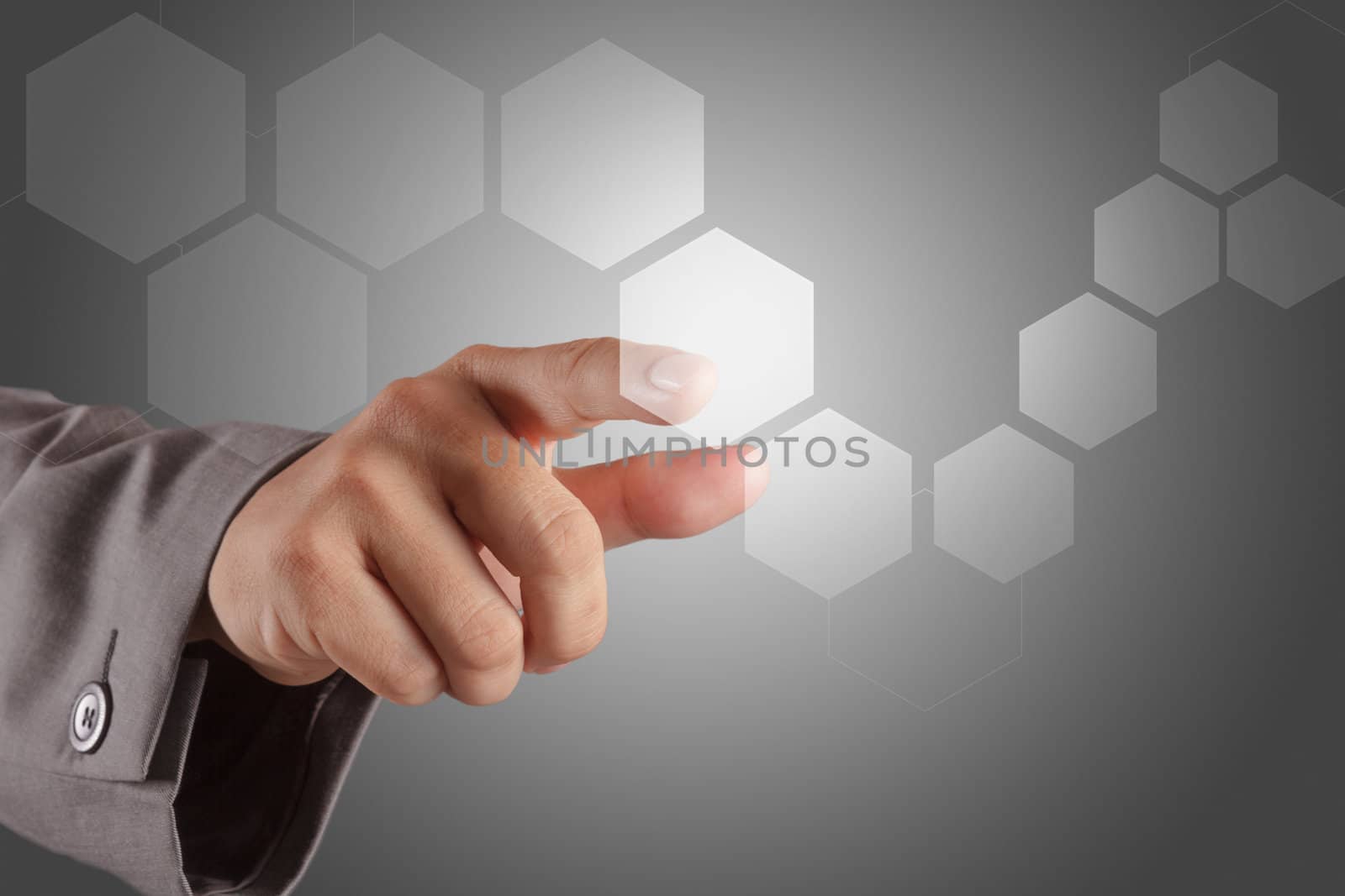 business man hand pushing on a virtual touch screen interface