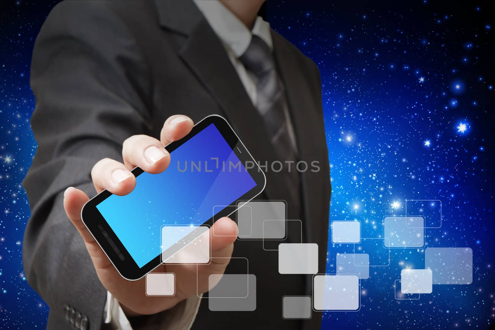 touch screen mobile phone in businessman hand by buchachon