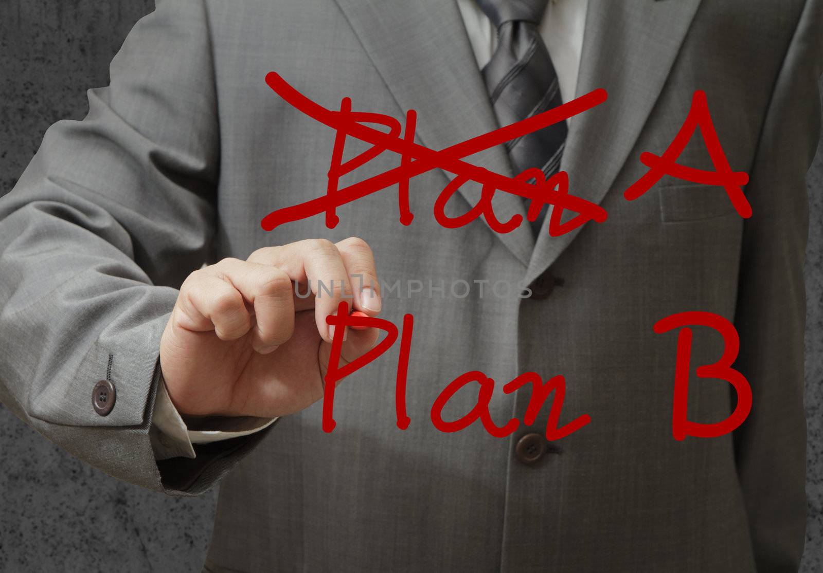 businessman hand drawing plan a plan b