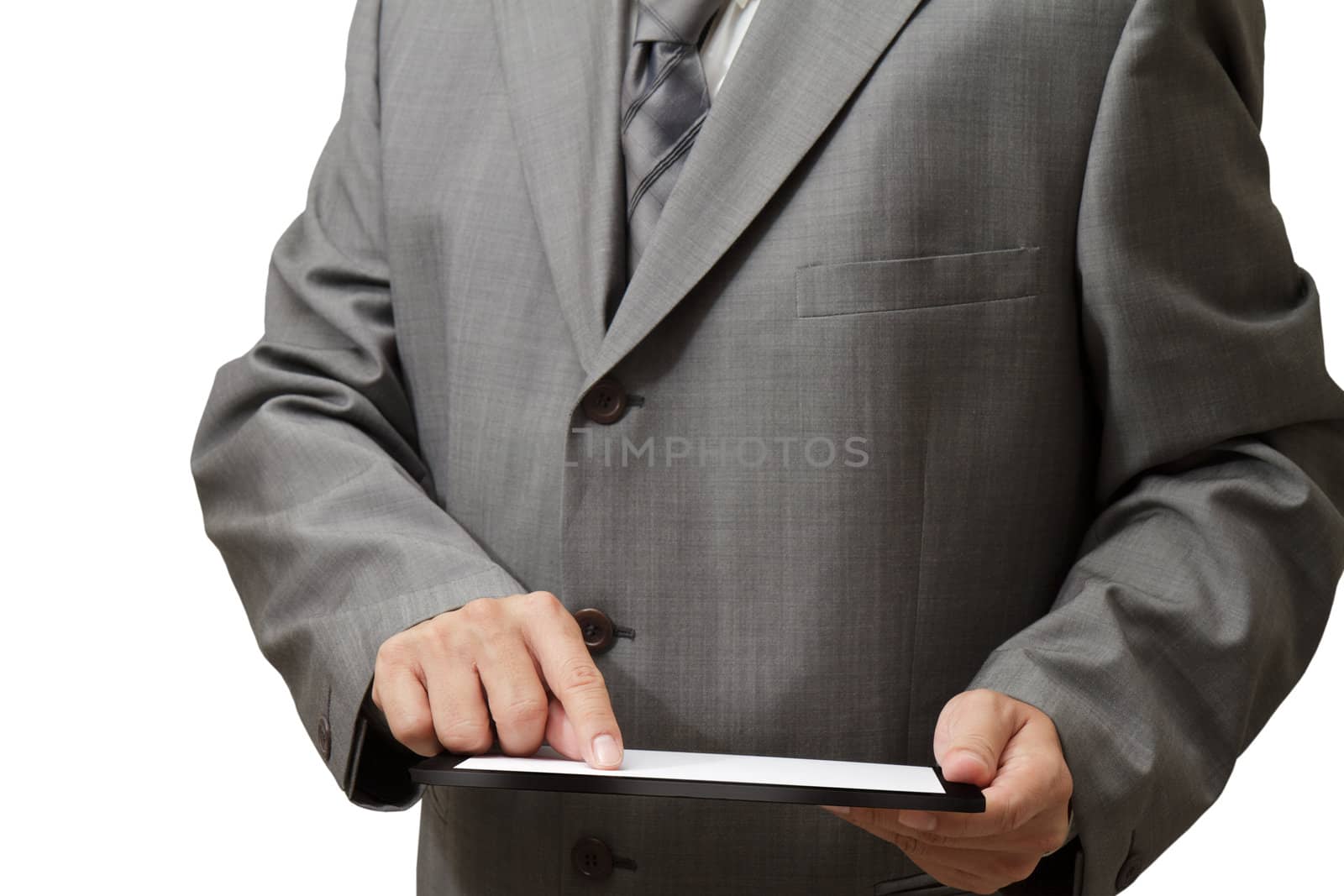 Handsome businessman using his digital tablet