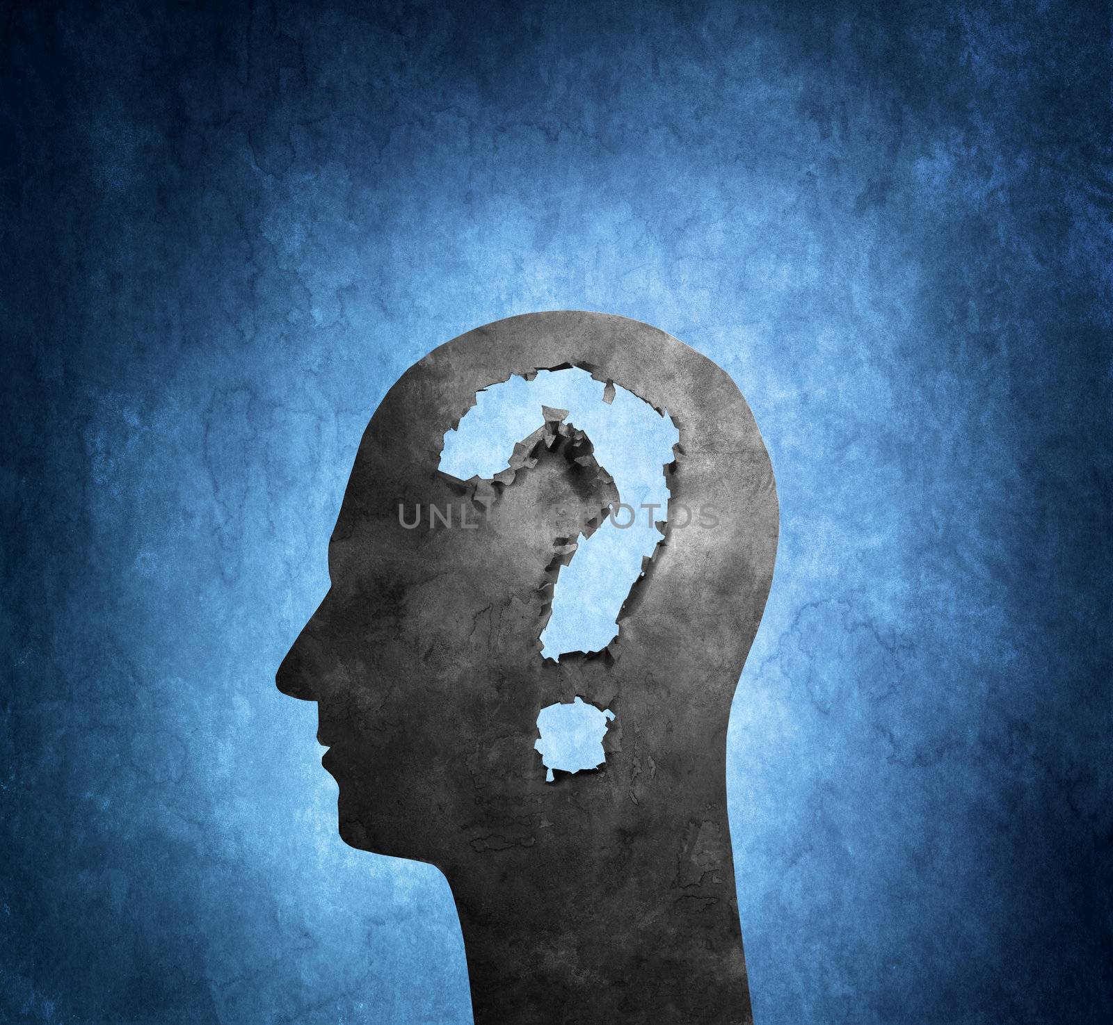 Human head cardboard silhouette with torn holes shaped like a question mark.